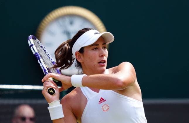 Mandatory Credit: Photo by Javier Garcia Shutterstock (12193040az) Garbine Muguruza during her third round match Wimbledon Tennis Championships, Day 5, The All England Lawn Tennis and Croquet Club, London, UK - 02 Jul 2021 Wimbledon Tennis Championships, Day 5, The All England Lawn Tennis and Croquet Club, London, UK - 02 Jul 2021  Copyright: xJavierxGarcia Shutterstockx 12193040az