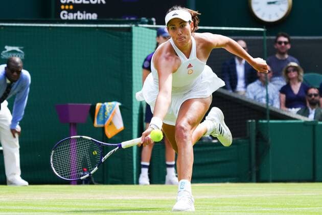 Mandatory Credit: Photo by Javier Garcia Shutterstock (12193040bz) Garbine Muguruza during her third round match Wimbledon Tennis Championships, Day 5, The All England Lawn Tennis and Croquet Club, London, UK - 02 Jul 2021 Wimbledon Tennis Championships, Day 5, The All England Lawn Tennis and Croquet Club, London, UK - 02 Jul 2021  Copyright: xJavierxGarcia Shutterstockx 12193040bz