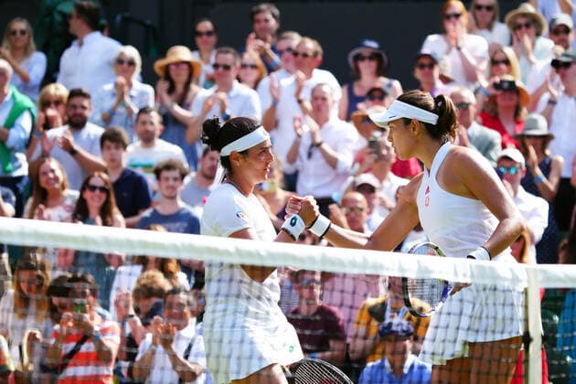 Mandatory Credit: Photo by Javier Garcia Shutterstock (12193040do) Ons Jabeur is congratulated by Garbine Muguruza after their third round match Wimbledon Tennis Championships, Day 5, The All England Lawn Tennis and Croquet Club, London, UK - 02 Jul 2021 Wimbledon Tennis Championships, Day 5, The All England Lawn Tennis and Croquet Club, London, UK - 02 Jul 2021  Copyright: xJavierxGarcia Shutterstockx 12193040do