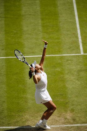 Mandatory Credit: Photo by Shutterstock (12193047az) Garbine Muguruza of Spain in action Wimbledon Tennis Championships, Day 5, The All England Lawn Tennis and Croquet Club, London, UK - 02 Jul 2021 Wimbledon Tennis Championships, Day 5, The All England Lawn Tennis and Croquet Club, London, UK - 02 Jul 2021  Copyright: xShutterstockx 12193047az