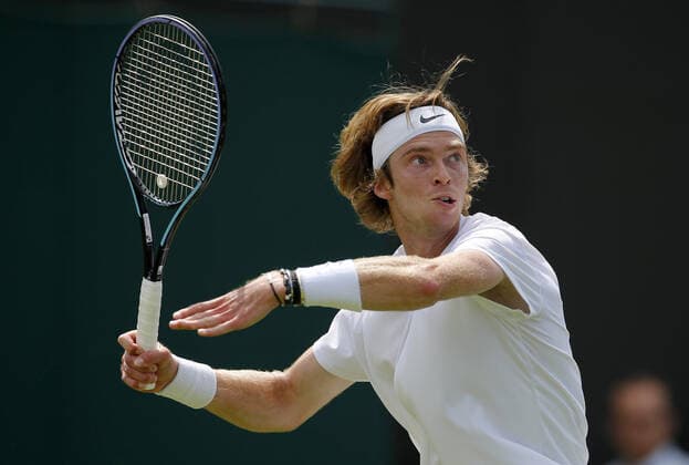 Mandatory Credit: Photo by Shutterstock (12193047at) Andrey Rublev of Russia in action Wimbledon Tennis Championships, Day 5, The All England Lawn Tennis and Croquet Club, London, UK - 02 Jul 2021 Wimbledon Tennis Championships, Day 5, The All England Lawn Tennis and Croquet Club, London, UK - 02 Jul 2021  Copyright: xShutterstockx 12193047at