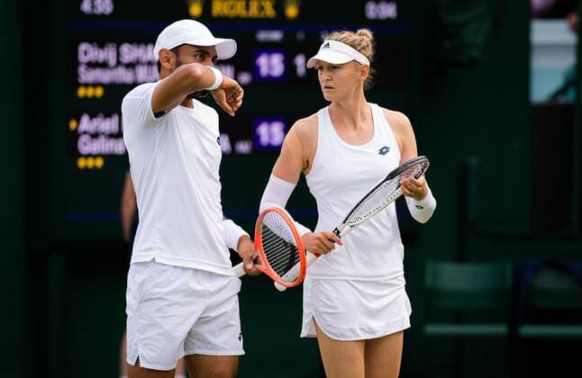 Mandatory Credit: Photo by Rob Prange Shutterstock (12193043av) Divij Sharan of India & Samantha Murray Sharan of Great Britain playing mixed doubles at the 2021 Wimbledon Championships Grand Slam tennis tournament Wimbledon Tennis Championships, Day 5, The All England Lawn Tennis and Croquet Club, London, UK - 02 Jul 2021 Wimbledon Tennis Championships, Day 5, The All England Lawn Tennis and Croquet Club, London, UK - 02 Jul 2021  Copyright: xRobxPrange Shutterstockx 12193043av