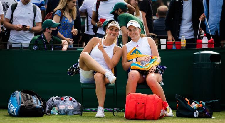 Mandatory Credit: Photo by Rob Prange Shutterstock (12193043bm) Marta Kostyuk of Ukraine & Jelena Ostapenko of Latvia playing doubles at the 2021 Wimbledon Championships Grand Slam tennis tournament Wimbledon Tennis Championships, Day 5, The All England Lawn Tennis and Croquet Club, London, UK - 02 Jul 2021 Wimbledon Tennis Championships, Day 5, The All England Lawn Tennis and Croquet Club, London, UK - 02 Jul 2021  Copyright: xRobxPrange Shutterstockx 12193043bm