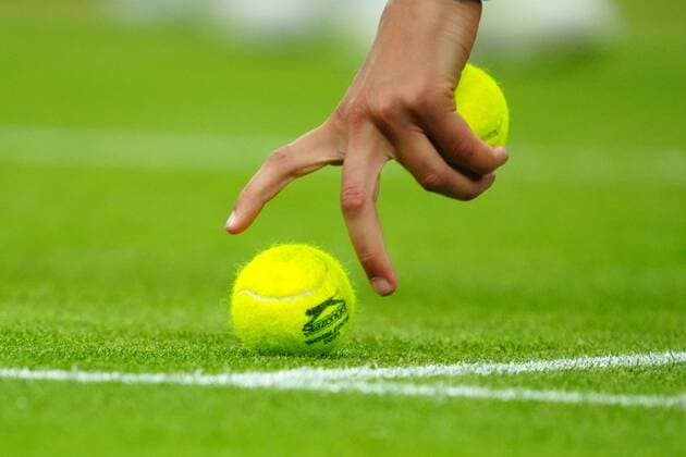 Mandatory Credit: Photo by Javier Garcia Shutterstock (12193040ku) Ball Boy with tennis balls Wimbledon Tennis Championships, Day 5, The All England Lawn Tennis and Croquet Club, London, UK - 02 Jul 2021 Wimbledon Tennis Championships, Day 5, The All England Lawn Tennis and Croquet Club, London, UK - 02 Jul 2021  Copyright: xJavierxGarcia Shutterstockx 12193040ku