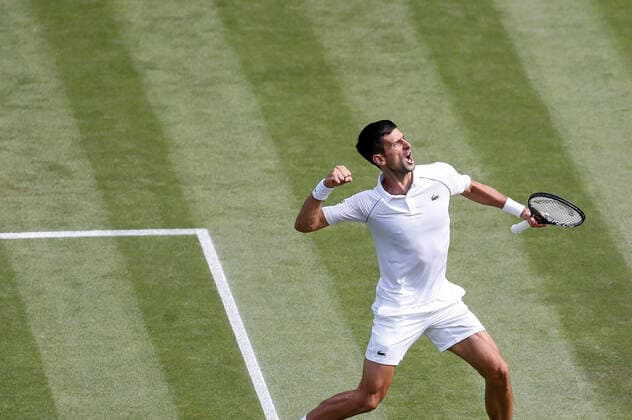 (210703) -- LONDON, July 3, 2021 -- Novak Djokovic of Serbia celebrates after winning a point during the men s singles third round match between Novak Djokovic of Serbia and Denis Kudla of the United States at Wimbledon tennis Championship in London, Britain, on July 2, 2021. ) (SP)BRITAIN-LONDON-TENNIS-WIMBLEDON-DAY 5 HanxYan 