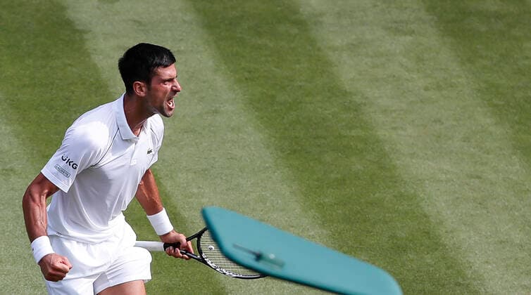 (210703) -- LONDON, July 3, 2021 -- Novak Djokovic of Serbia celebrates after winning a point during the men s singles third round match between Novak Djokovic of Serbia and Denis Kudla of the United States at Wimbledon tennis Championship in London, Britain, on July 2, 2021. ) (SP)BRITAIN-LONDON-TENNIS-WIMBLEDON-DAY 5 HanxYan 