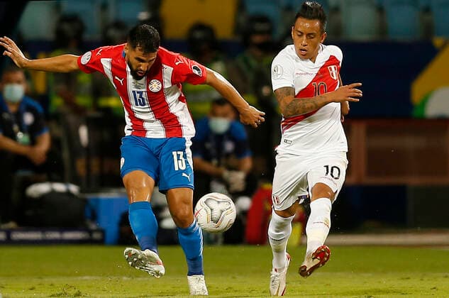 (210703) -- GOIANIA, July 3, 2021 -- Peru s Christian Cueva (R) vies with Paraguay s Alberto Espinola during the 2021 Copa America Quarterfinals football match between Peru and Paraguay in Goiania, Brazil, on July 2, 2021. ) (SP)BRAZIL-GOIANIA-COPA AMERICA-PERU VS PARAGUAY LUCIOxTAVORA 