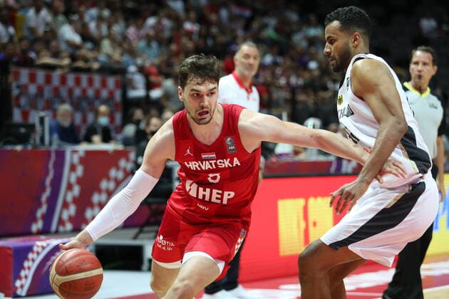 Germany v Croatia - Semi Final: 2020 FIBA Men s Olympic Qualifying Tournament Mario Hezonja of Croatia in action against Johannes Thiemann of Germany during the 2020 FIBA Men s Olympic Qualifying Tournament game between Germany and Croatia at Spaladium Arena on July 3, 2021 in Split, Croatia. IvoxCagalj PIXSELL