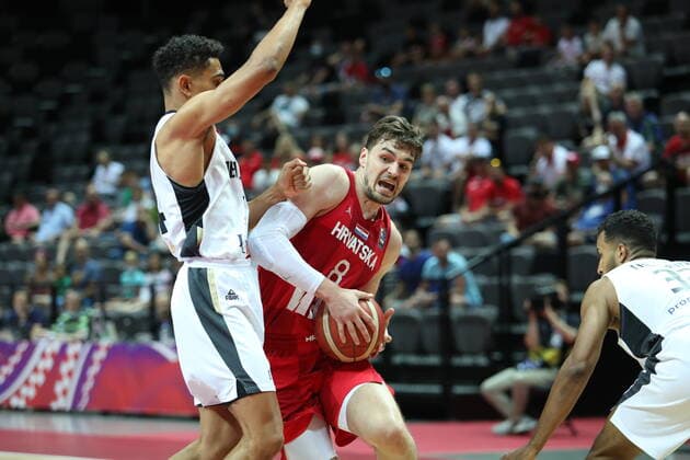 Germany v Croatia - Semi Final: 2020 FIBA Men s Olympic Qualifying Tournament Mario Hezonja of Croatia in action against Johannes Thiemann of Germany during the 2020 FIBA Men s Olympic Qualifying Tournament game between Germany and Croatia at Spaladium Arena on July 3, 2021 in Split, Croatia. IvoxCagalj PIXSELL