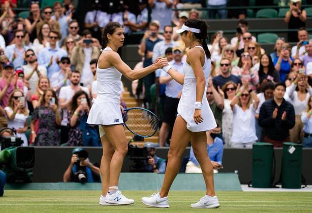 Mandatory Credit: Photo by Rob Prange Shutterstock (12194627m) Sorana Cirstea of Romania & Emma Raducanu of Great Britain after the third round at the 2021 Wimbledon Championships Grand Slam tennis tournament Wimbledon Tennis Championships, Day 6, The All England Lawn Tennis and Croquet Club, London, UK - 03 Jul 2021 Wimbledon Tennis Championships, Day 6, The All England Lawn Tennis and Croquet Club, London, UK - 03 Jul 2021  Copyright: xRobxPrange Shutterstockx 12194627m