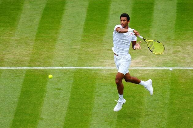 Mandatory Credit: Photo by Javier Garcia Shutterstock (12194408cj) Felix Auger-Aliassime during his third round match Wimbledon Tennis Championships, Day 6, The All England Lawn Tennis and Croquet Club, London, UK - 03 Jul 2021 Wimbledon Tennis Championships, Day 6, The All England Lawn Tennis and Croquet Club, London, UK - 03 Jul 2021  Copyright: xJavierxGarcia Shutterstockx 12194408cj