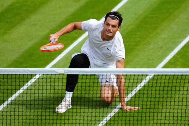 Mandatory Credit: Photo by Javier Garcia Shutterstock (12194408dm) Taylor Fritz loses his footing during his third round match Wimbledon Tennis Championships, Day 6, The All England Lawn Tennis and Croquet Club, London, UK - 03 Jul 2021 Wimbledon Tennis Championships, Day 6, The All England Lawn Tennis and Croquet Club, London, UK - 03 Jul 2021  Copyright: xJavierxGarcia Shutterstockx 12194408dm