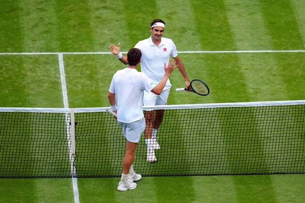 Mandatory Credit: Photo by Javier Garcia Shutterstock (12194408ga) Roger Federer celebrates victory in his third round match and is congratulated by Cameron Norrie Wimbledon Tennis Championships, Day 6, The All England Lawn Tennis and Croquet Club, London, UK - 03 Jul 2021 Wimbledon Tennis Championships, Day 6, The All England Lawn Tennis and Croquet Club, London, UK - 03 Jul 2021  Copyright: xJavierxGarcia Shutterstockx 12194408ga