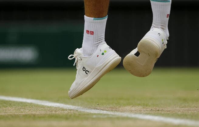 Mandatory Credit: Photo by Shutterstock (12194410bi) Shoes of Roger Federer of Switzerland in action Wimbledon Tennis Championships, Day 6, The All England Lawn Tennis and Croquet Club, London, UK - 03 Jul 2021 Wimbledon Tennis Championships, Day 6, The All England Lawn Tennis and Croquet Club, London, UK - 03 Jul 2021  Copyright: xShutterstockx 12194410bi