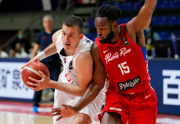 (210704) -- BELGRADE, July 4, 2021 -- Serbia s Nemanja Bjelica (L) vies with Puerto Rico s Timajh Dyquan Parker Rivera during FIBA Olympic Qualifying Tournament basketball semi-final match between Serbia and Puerto Rico in Belgrade, Serbia on July 3, 2021. (Photo by Xinhua) (SP)SERBIA-BELGRADE-BASKETBALL-FIBA OQT-SEMI-FINALS-SERBIA VS PUERTO RICO PredragxMilosavljevic 