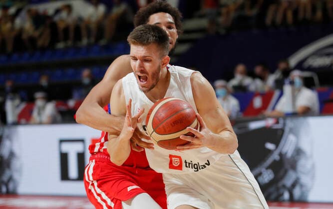 (210704) -- BELGRADE, July 4, 2021 -- Serbia s Filip Petrusev (F) vies with Puerto Rico s George Conditt during FIBA Olympic Qualifying Tournament basketball semi-final match between Serbia and Puerto Rico in Belgrade, Serbia on July 3, 2021. (Photo by Xinhua) (SP)SERBIA-BELGRADE-BASKETBALL-FIBA OQT-SEMI-FINALS-SERBIA VS PUERTO RICO PredragxMilosavljevic 