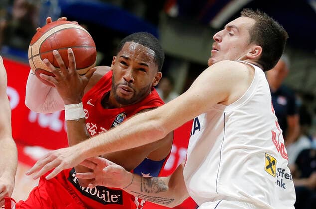 (210704) -- BELGRADE, July 4, 2021 -- Puerto Rico s Gary Browne (L) vies with Serbia s Danilo Andjusic during FIBA Olympic Qualifying Tournament basketball semi-final match between Serbia and Puerto Rico in Belgrade, Serbia on July 3, 2021. (Photo by Xinhua) (SP)SERBIA-BELGRADE-BASKETBALL-FIBA OQT-SEMI-FINALS-SERBIA VS PUERTO RICO PredragxMilosavljevic 
