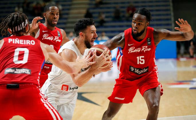 (210704) -- BELGRADE, July 4, 2021 -- Serbia s Vasilije Micic (2nd R) vies with Puerto Rico s Timajh Dyquan Parker Rivera (1st R) and Isaiah Pineiro (1st L) during FIBA Olympic Qualifying Tournament basketball semi-final match between Serbia and Puerto Rico in Belgrade, Serbia on July 3, 2021. (Photo by Xinhua) (SP)SERBIA-BELGRADE-BASKETBALL-FIBA OQT-SEMI-FINALS-SERBIA VS PUERTO RICO PredragxMilosavljevic 