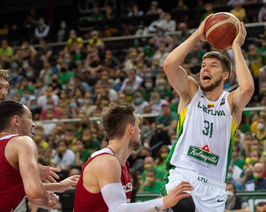 (210704) -- KAUNAS, July 4, 2021 -- Rokas Giedraitis (R) of Lithuania competes during FIBA Olympic Qualifyng Tournament basketball semi-final match between Lithuania and Poland in Kaunas, Lithuania, July 3, 2021. (Photo by Xinhua) (SP)LITHUANIA-KAUNAS-BASKETBALL- FIBA OQT-SEMI-FINALS-LITHUANIA VS POLAND AlfredasxPliadis 