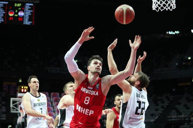 (210704) -- SPLIT, July 4, 2021 -- Mario Hezonja (Front, L) of Croatia competes during the 2020 FIBA Olympic Qualifying Tournament semi-final match between Croatia and Germany in Split, Croatia, July 3, 2021. ( Pixsell via Xinhua) (SP) CROATIA-SPLIT-FIBA OQT-SEMI-FINALS-CROATIA VS GERMANY IvoxCagalj 