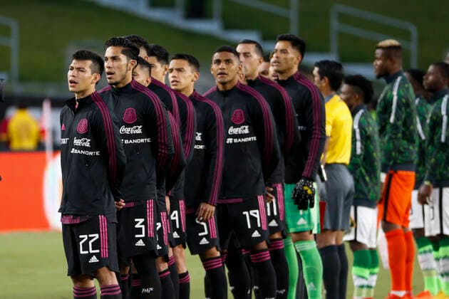 July 3, 2021, Los Angeles, California, USA: Mexico players listen to their national anthem prior to an International Friendly, Länderspiel, Nationalmannschaft soccer match between Nigeria and Mexico at the Los Angeles Memorial Coliseum in Los Angeles, Saturday, July. 3, 2021. Los Angeles USA - ZUMAc68_ 20210703_zaf_c68_016 Copyright: xRingoxChiux