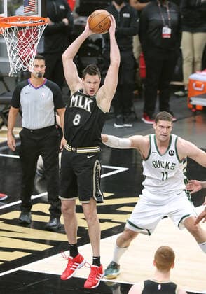 July 3, 2021, Atlanta, GA, USA: The Atlanta Hawks Danilo Gallinari (8) grabs a defensive rebound over the Milwaukee Bucks Brook Lopez (11) in Game 6 of the Eastern Conference Finals on Saturday, July 3, 2021, at State Farm Arena in Atlanta. The Bucks advanced, 118-107. Atlanta USA - ZUMAm67_ 0124090254st Copyright: xCurtisxComptonx