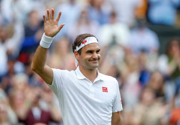 (210704) -- LONDON, July 4, 2021 -- Roger Federer of Switzerland reacts after the men s singles third round match against Cameron Norrie of Great Britain at Wimbledon tennis Championship in London, Britain, July 3, 2021. ) (SP)BRITAIN-LONDON-TENNIS-WIMBLEDON-MEN S SINGLES HanxYan 