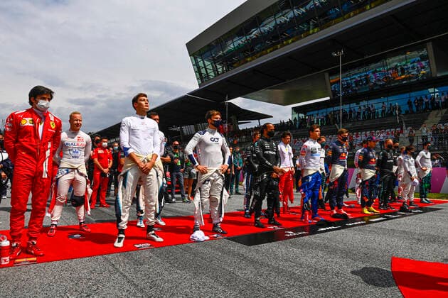 F1 Grand Prix of Austria F1 drivers during national anthem, F1 Grand Prix of Austria at Red Bull Ring on July 4, 2021 in Spielberg, Austria. (Photo by Mark Sutton LAT Motorsport Images FIA Pool via HOCH ZWEI) Spielberg Austria Poolfoto HOCH ZWEI Pool Motorsport Images ,EDITORIAL USE ONLY