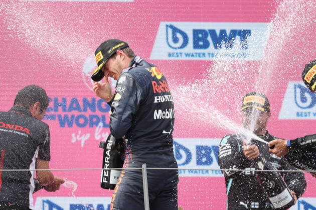 FORMULA 1 - GP of Austria 2021 SPIELBERG,AUSTRIA,04.JUL.21 - MOTORSPORTS, FORMULA 1 - Grand Prix of Austria, Red Bull Ring. Image shows the rejoicing of Max Verstappen (NED Red Bul Racing) and Valtteri Bottas (FIN Mercedes). Keywords: champagne shower.  GEPAxpictures xChristianxWalgram