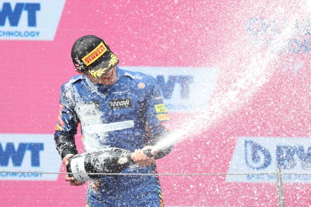 FORMULA 1 - GP of Austria 2021 SPIELBERG,AUSTRIA,04.JUL.21 - MOTORSPORTS, FORMULA 1 - Grand Prix of Austria, Red Bull Ring. Image shows the rejoicing of Lando Norris (GBR McLaren). Keywords: champagne shower.  GEPAxpictures xChristianxWalgram
