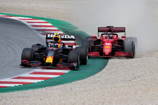 Sergio Perez Red Bull Racing Honda pushes Charles Leclerc Scuderia Ferrari Mission Winnow into the gravel off the track and gets a 5 second penalty, AUT, Formula 1 Grand Prix of Austria, Red Bull Ring Spielberg, Race 9, Season 2021, 04 07 2021 AUT, Formula 1 Grand Prix of Austria, Red Bull Ring Spielberg, Race 9, Season 2021, 04 07 2021 Spielberg Copyright: xEibnerxPressefoto MichaelxMemmlex EP_MMR