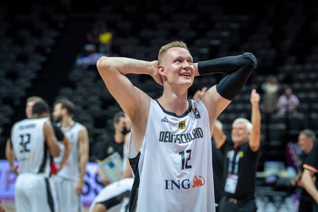 Basketball Split 04 07 2021 Olympic Qualifiers FIBA Olympic Qualifying Tournament 2020 Final Germany GER Brazil BRA Germany qualifies for the Tokyo Olympics with a win over Brazil Cheers Germany Robin Benzing Germany, No 12 cheers stunned