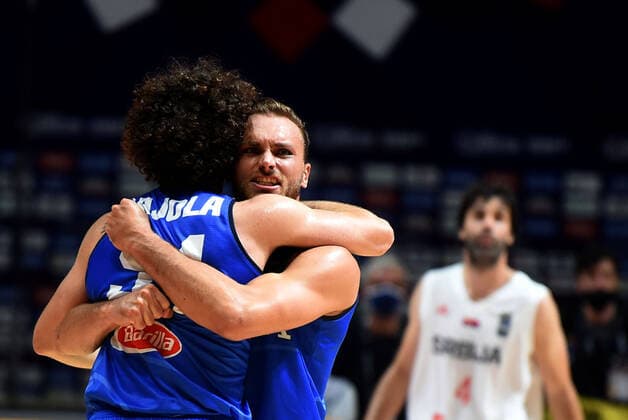 04.07.2021 Belgrade Serbia-Italy FIBA Olympic qualifying tournament final men s basketball Stefano Tonut (C) with Alessandro Pajola(L) Italy celebrate during match :Str
