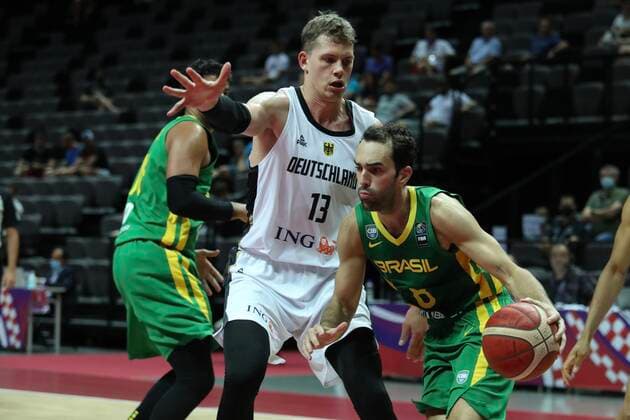 (210705) -- SPLIT (CROATIA), July 5, 2021 -- Vitor Benite (R) of Brazil dribbles during the 2020 FIBA Men s Olympic Qualifying Tournament final match between Germany and Brazil in Split, Croatia, July 4, 2021. ( Pixsell via Xinhua) (SP)CROATIA-SPLIT-FIBA OQT-FINALS-BRAZIL VS GERMANY IvoxCagalj 