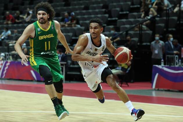 (210705) -- SPLIT (CROATIA), July 5, 2021 -- Maodo Lo (R) of Germany breaks through during the 2020 FIBA Men s Olympic Qualifying Tournament final match between Germany and Brazil in Split, Croatia, July 4, 2021. ( Pixsell via Xinhua) (SP)CROATIA-SPLIT-FIBA OQT-FINALS-BRAZIL VS GERMANY IvoxCagalj 