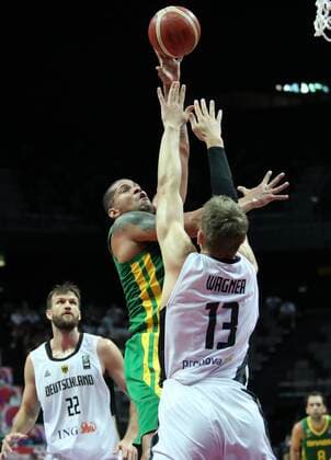 (210705) -- SPLIT (CROATIA), July 5, 2021 -- Rafael Hettsheimeir (C) of Brazil shoots during the 2020 FIBA Men s Olympic Qualifying Tournament final match between Germany and Brazil in Split, Croatia, July 4, 2021. ( Pixsell via Xinhua) (SP)CROATIA-SPLIT-FIBA OQT-FINALS-BRAZIL VS GERMANY IvoxCagalj 