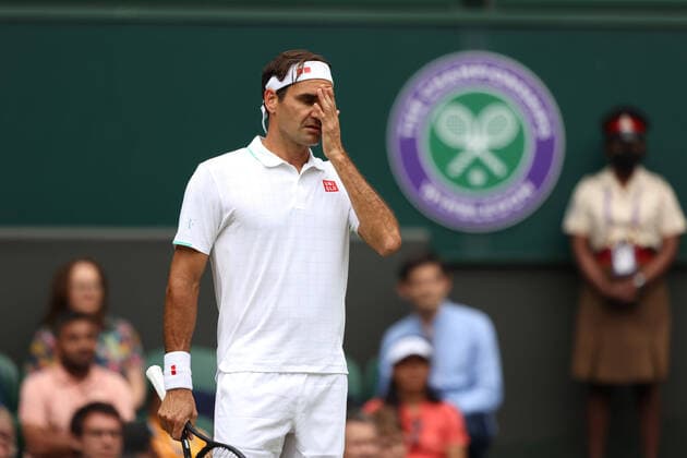 Roger Federer in action against Cameron Norrie in the third round. Wimbledon Day Six 