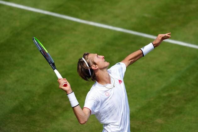 Mandatory Credit: Photo by Shutterstock (12196118u) Sebastian Korda during his fourth round match Wimbledon Tennis Championships, Day 7, The All England Lawn Tennis and Croquet Club, London, UK - 05 Jul 2021 Wimbledon Tennis Championships, Day 7, The All England Lawn Tennis and Croquet Club, London, UK - 05 Jul 2021  Copyright: xShutterstockx 12196118u