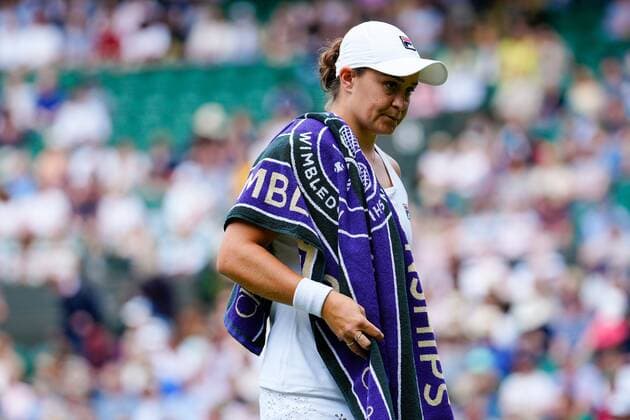 Mandatory Credit: Photo by Shutterstock (12196118ad) Ashleigh Barty with a Wimbledon towel during her fourth round match Wimbledon Tennis Championships, Day 7, The All England Lawn Tennis and Croquet Club, London, UK - 05 Jul 2021 Wimbledon Tennis Championships, Day 7, The All England Lawn Tennis and Croquet Club, London, UK - 05 Jul 2021  Copyright: xShutterstockx 12196118ad
