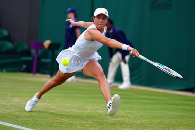 Mandatory Credit: Photo by Javier Garcia Shutterstock (12196117bw) Iga Swiatek during her fourth round match Wimbledon Tennis Championships, Day 7, The All England Lawn Tennis and Croquet Club, London, UK - 05 Jul 2021 Wimbledon Tennis Championships, Day 7, The All England Lawn Tennis and Croquet Club, London, UK - 05 Jul 2021  Copyright: xJavierxGarcia Shutterstockx 12196117bw