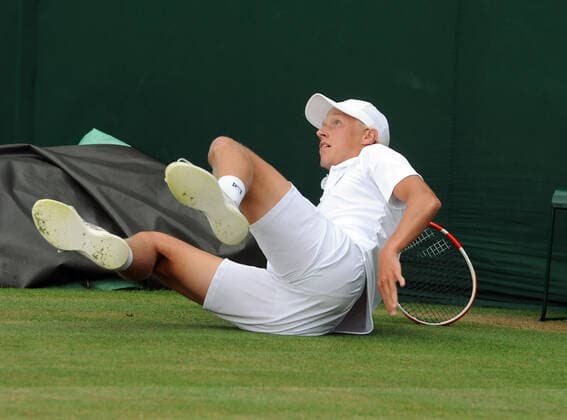 Lawn Tennis - 2021 All England Championships - Week Two - Monday - Wimbledon Leo Borg v Marko Topo Bjorn Borg™s son, Leo Borg slips on the grass 