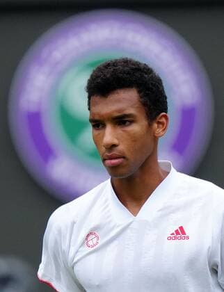 Mandatory Credit: Photo by Shutterstock (12196118dx) Felix Auger-Aliassime during his fourth round match Wimbledon Tennis Championships, Day 7, The All England Lawn Tennis and Croquet Club, London, UK - 05 Jul 2021 Wimbledon Tennis Championships, Day 7, The All England Lawn Tennis and Croquet Club, London, UK - 05 Jul 2021  Copyright: xShutterstockx 12196118dx