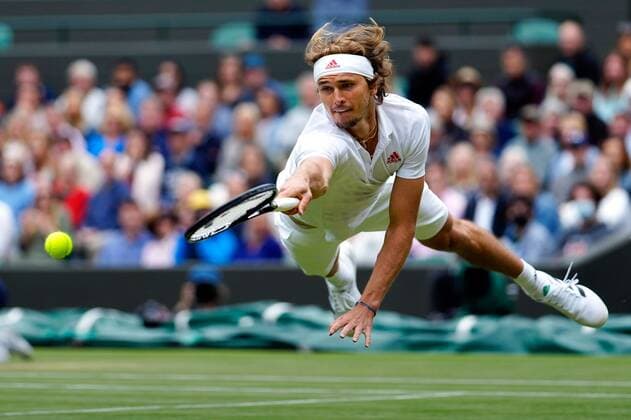 Mandatory Credit: Photo by Dave Shopland Shutterstock (12196118ed) Alexander Zverev diving during his fourth round match Wimbledon Tennis Championships, Day 7, The All England Lawn Tennis and Croquet Club, London, UK - 05 Jul 2021 Wimbledon Tennis Championships, Day 7, The All England Lawn Tennis and Croquet Club, London, UK - 05 Jul 2021  Copyright: xDavexShopland Shutterstockx 12196118ed