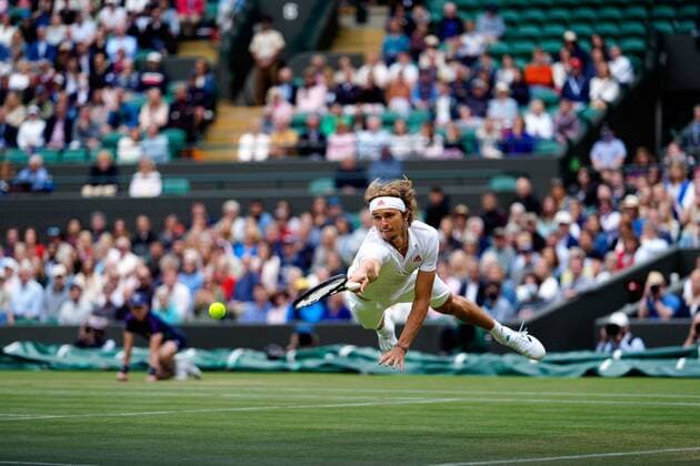 Mandatory Credit: Photo by Dave Shopland Shutterstock (12196118em) Alexander Zverev diving during his fourth round match Wimbledon Tennis Championships, Day 7, The All England Lawn Tennis and Croquet Club, London, UK - 05 Jul 2021 Wimbledon Tennis Championships, Day 7, The All England Lawn Tennis and Croquet Club, London, UK - 05 Jul 2021  Copyright: xDavexShopland Shutterstockx 12196118em