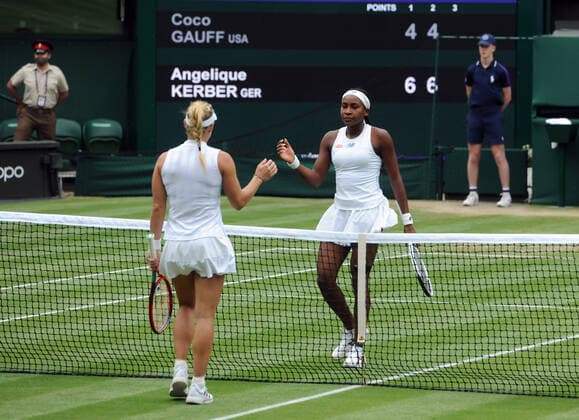 Lawn Tennis - 2021 All England Championships - Week Two - Monday - Wimbledon Coco Gauff v Angelique Kerber Angelique Kerber with Gauff after the match 