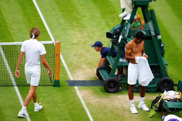 Mandatory Credit: Photo by Javier Garcia Shutterstock (12196117ke) Alexander Zverev and Felix Auger-Aliassime between games during their fourth round match Wimbledon Tennis Championships, Day 7, The All England Lawn Tennis and Croquet Club, London, UK - 05 Jul 2021 Wimbledon Tennis Championships, Day 7, The All England Lawn Tennis and Croquet Club, London, UK - 05 Jul 2021  Copyright: xJavierxGarcia Shutterstockx 12196117ke