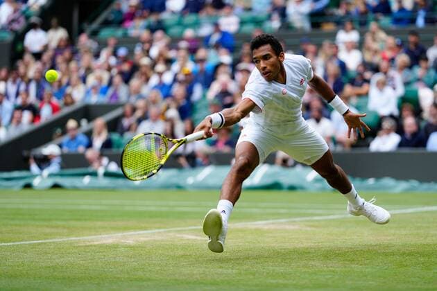 Mandatory Credit: Photo by Shutterstock (12196118gd) Felix Auger-Aliassime during his fourth round match Wimbledon Tennis Championships, Day 7, The All England Lawn Tennis and Croquet Club, London, UK - 05 Jul 2021 Wimbledon Tennis Championships, Day 7, The All England Lawn Tennis and Croquet Club, London, UK - 05 Jul 2021  Copyright: xShutterstockx 12196118gd
