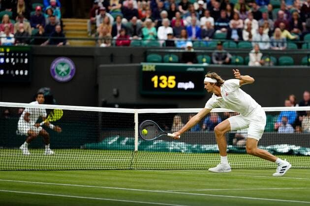 Mandatory Credit: Photo by Shutterstock (12196118gp) Alexander Zverev and Felix Auger-Aliassime during their fourth round match Wimbledon Tennis Championships, Day 7, The All England Lawn Tennis and Croquet Club, London, UK - 05 Jul 2021 Wimbledon Tennis Championships, Day 7, The All England Lawn Tennis and Croquet Club, London, UK - 05 Jul 2021  Copyright: xShutterstockx 12196118gp