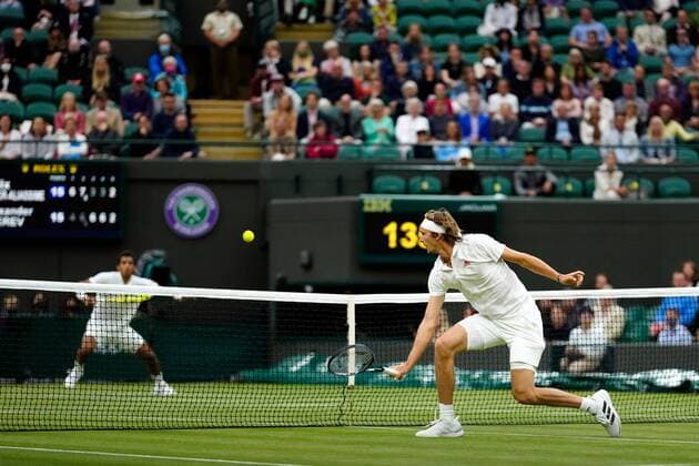 Mandatory Credit: Photo by Shutterstock (12196118gq) Alexander Zverev and Felix Auger-Aliassime during their fourth round match Wimbledon Tennis Championships, Day 7, The All England Lawn Tennis and Croquet Club, London, UK - 05 Jul 2021 Wimbledon Tennis Championships, Day 7, The All England Lawn Tennis and Croquet Club, London, UK - 05 Jul 2021  Copyright: xShutterstockx 12196118gq