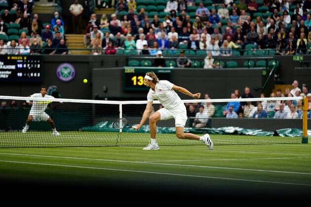 Mandatory Credit: Photo by Shutterstock (12196118gr) Alexander Zverev and Felix Auger-Aliassime during their fourth round match Wimbledon Tennis Championships, Day 7, The All England Lawn Tennis and Croquet Club, London, UK - 05 Jul 2021 Wimbledon Tennis Championships, Day 7, The All England Lawn Tennis and Croquet Club, London, UK - 05 Jul 2021  Copyright: xShutterstockx 12196118gr